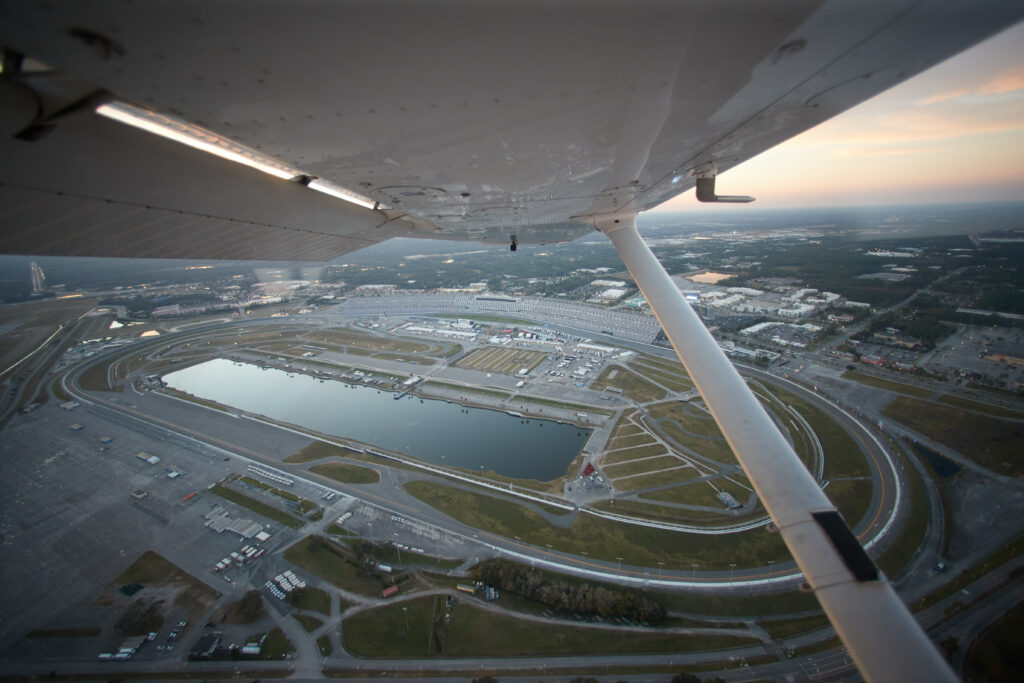 aerial view of Daytona Beach International Speedway outside of window of Cessna 172
