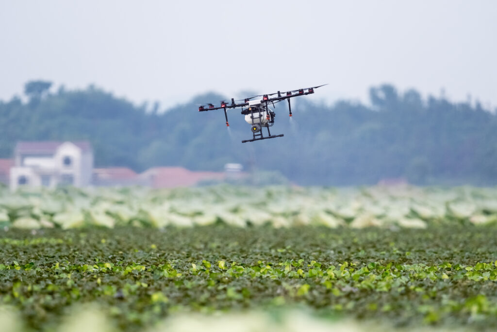 agriculture drones spraying field